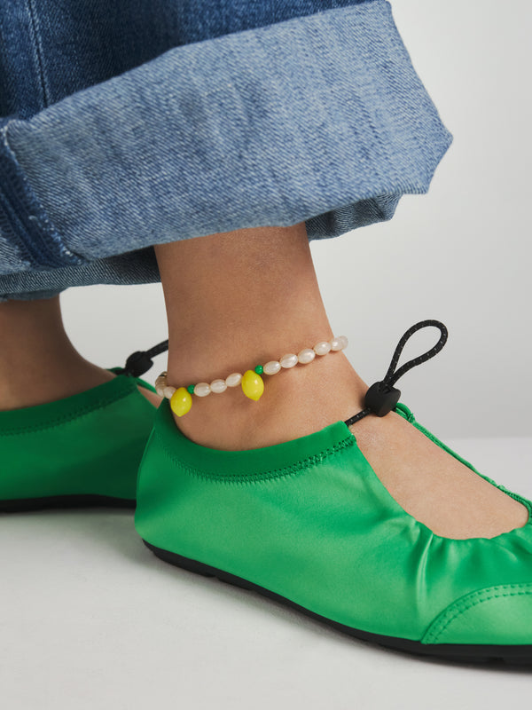 Bransoletka na kostkę z białych koralików z cytrynką