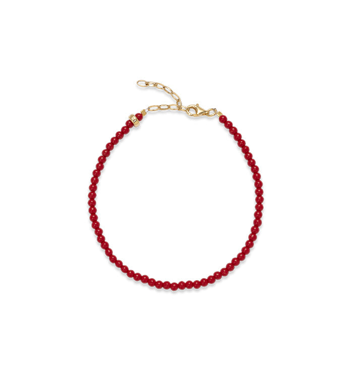 Seeds anklet with gold-plated details